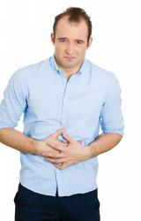 upset-stomach-shutterstock-176228270-smaller-for-web-598cb97d5d3ae Man with stomach pain